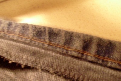 Either cut off the excess material and edge - I just zig-zgged as I couldn't be bothered getting out the overlocker.