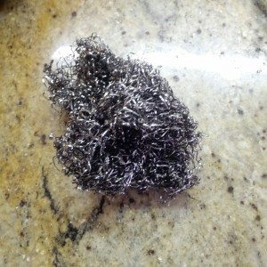 Steel wool to scrub clean the sweet potatoes