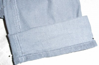 Put on jeans inside out and pin so the hem sits where you want the finished length to be.