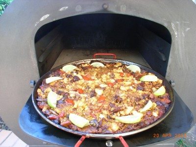 Paella in a wood fired pizza oven